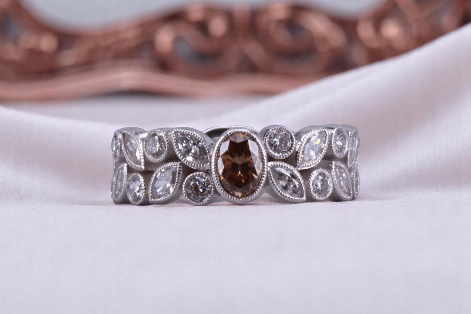 Non-traditional rootbeer diamond floral ring for couples in Rancho Santa Fe